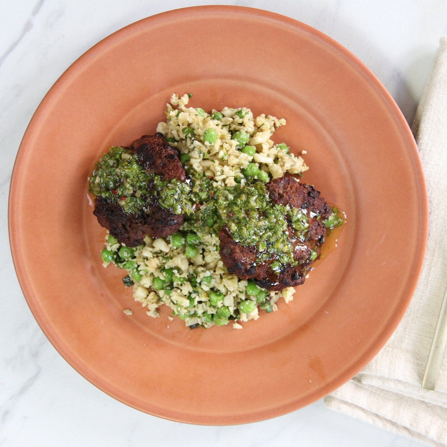 -Caramelized Onion Burgers with Chimichurri Sauce, over Cilantro Cauliflower Rice & Peas - Pete's Real Food