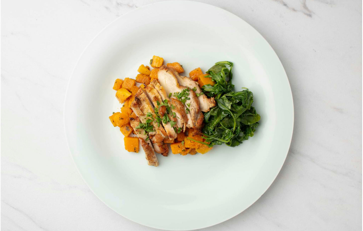 Grilled Chicken with Butternut Squash and Sautéed Arugula with Onions