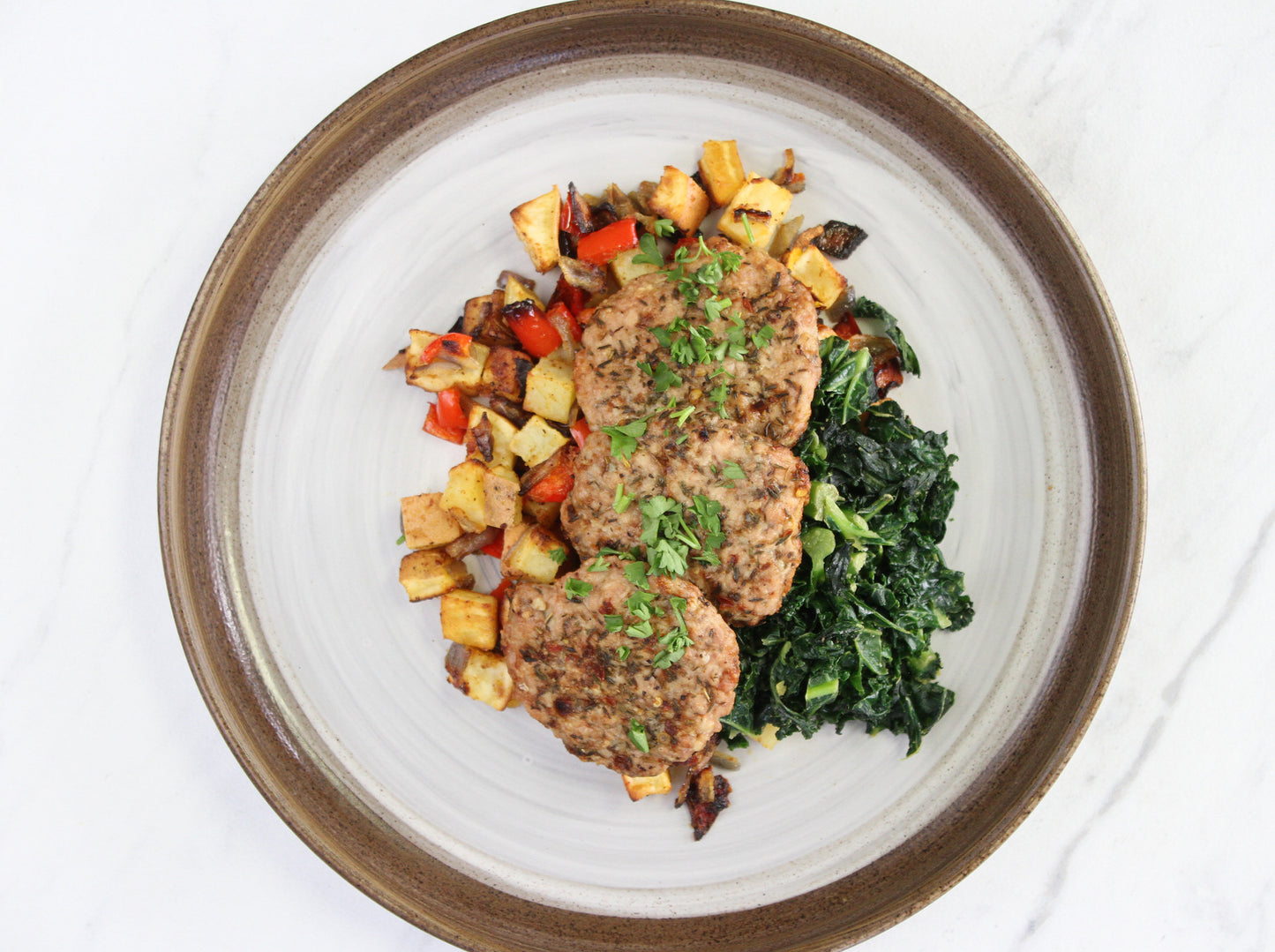 Jerked Chicken Sausage with Sweet Potato Hash and Kale