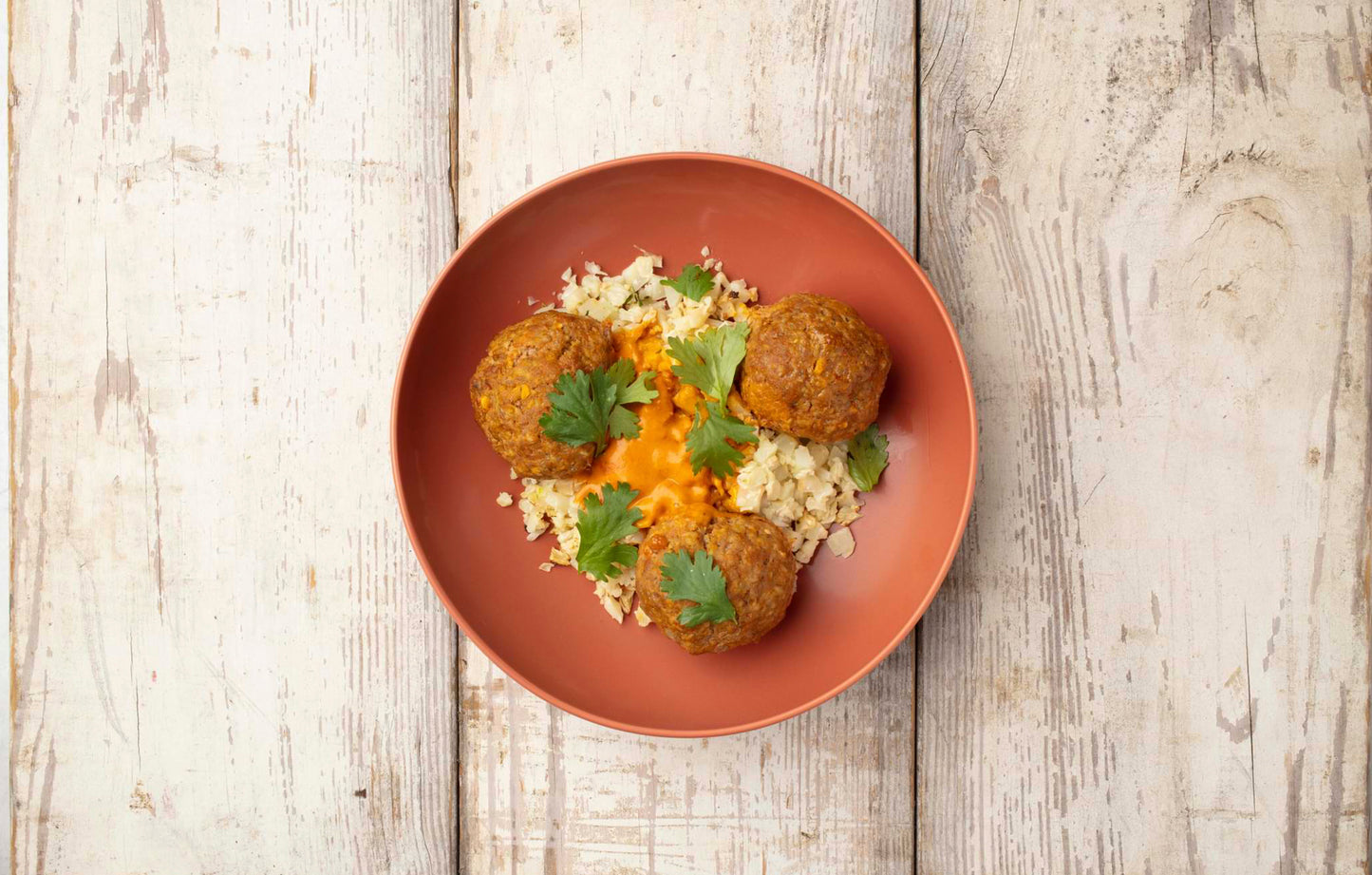 Creamy Red Curry Pork Meatballs with Cauliflower Rice