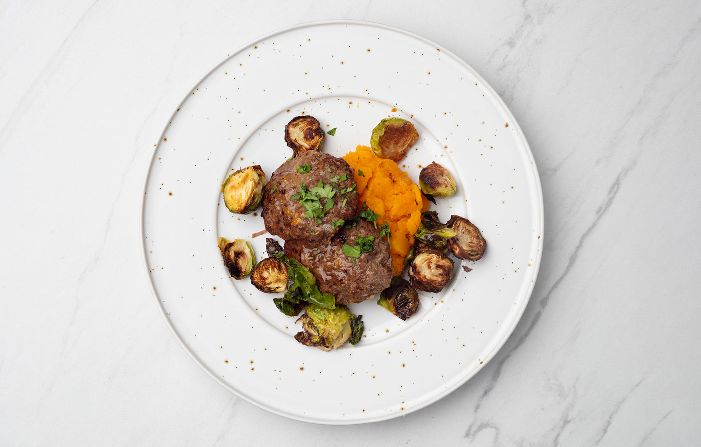 Caramelized Onion Burger with Roasted Brussels and Butternut Mash