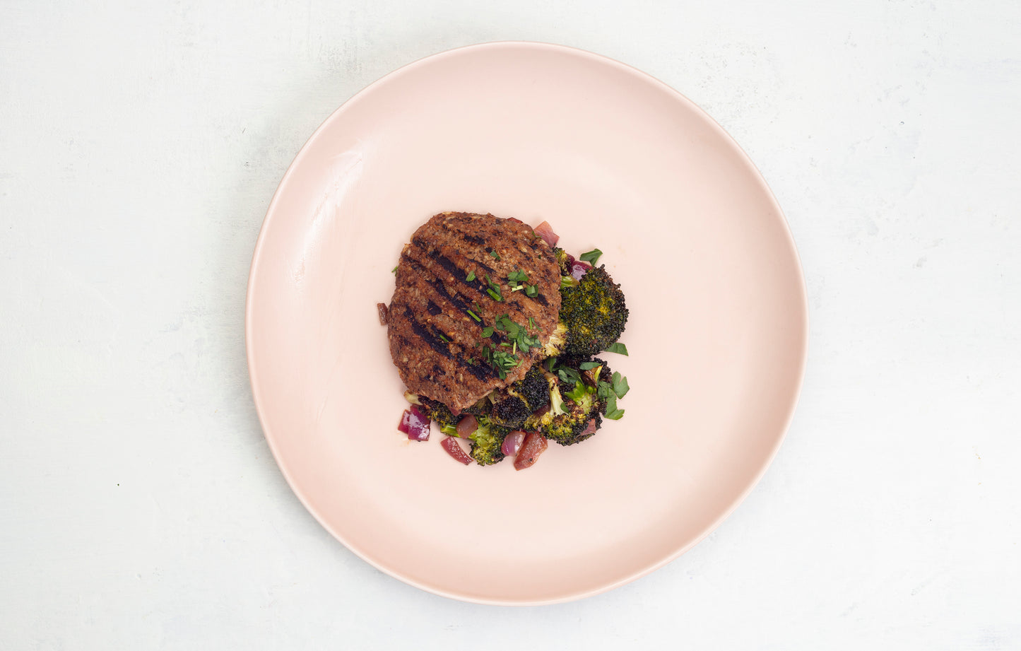 Grilled Vegan Mushroom Burger with Broccoli and Red Onion Salad