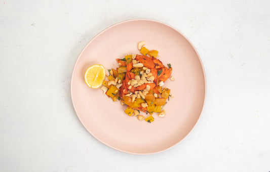 Citrus Beet and Roasted Carrot Salad with Mint and Pine Nuts over Quinoa