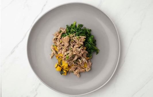Balsamic Braised Pulled Pork with Acorn Squash and Sautéed Kale