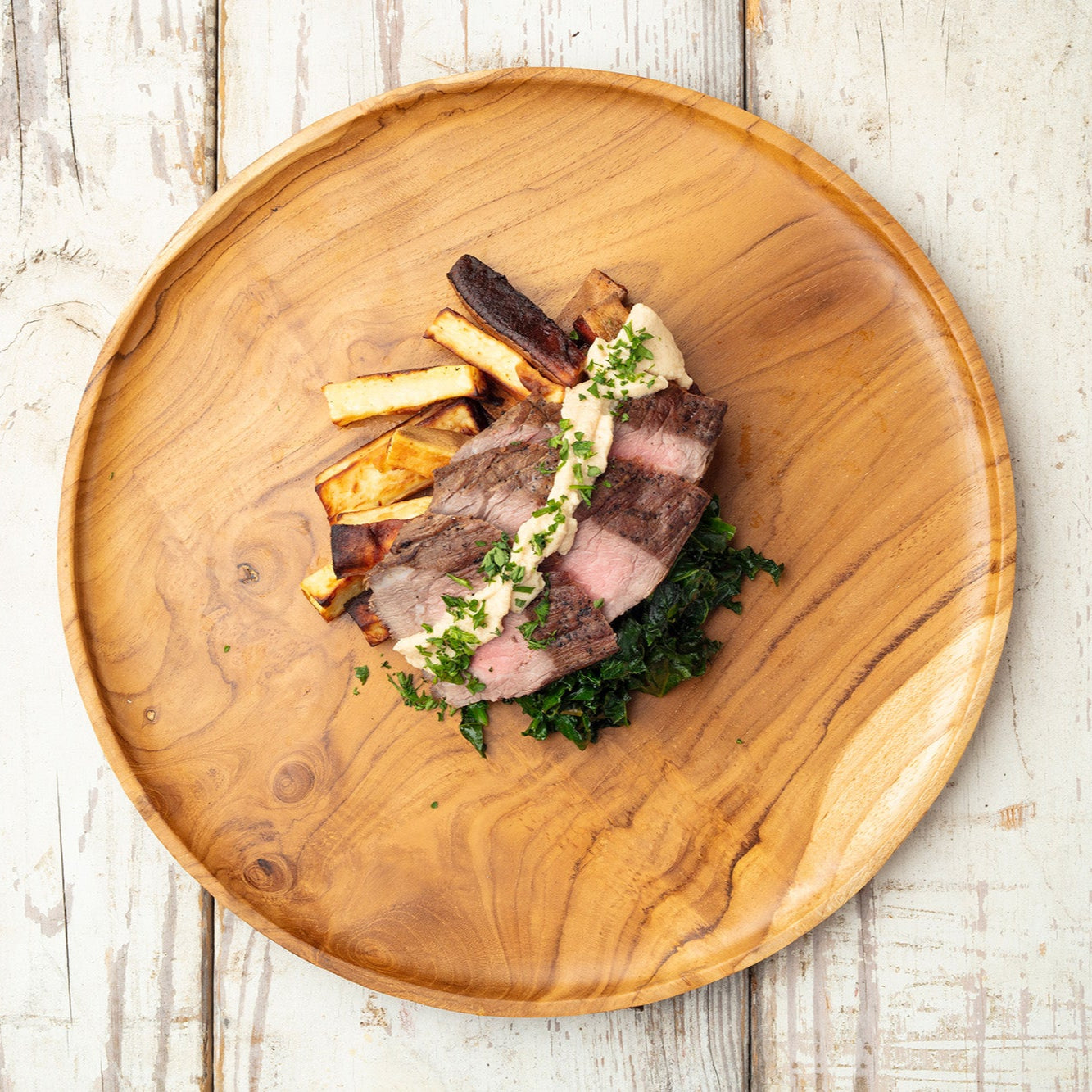 Steak with Horseradish Sauce, Sweet Potato Wedges, and Sautéed Kale - Pete's Real Food